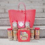 Michelle Chong Instagram - Was rushing home to share these CNY goodies with the family and couldn't help but eat some along the way.😝 There’s no better LOVE LETTER 💌 to gift your family & friends than these delectable @taisun.sg CNY treats in limited-edition festive packaging! It’s a must-have for Chinese New Year gatherings as you watch your family and friends go NUTS 🥜 over these goodies - from Ah Ma's Traditional Nonya Love Letters in its iconic red tin, to yummy & healthy @NaturesWondersCoSG nut mixes and crunchy NOYA Prawn Rolls which is perfect for a spice lover like me! So let the new year ROLL in with Tai Sun's crowd favourites, available till Feb 2023 at all leading super/hyper markets and Nature's Wonders e-store (https://sg.natureswonders.co/), while stocks last! Don’t miss your chance to win a festive bag of CNY goodies from Tai Sun to share with your family! Simply like this post and follow @immichellechong and @taisun.sg. The giveaway ends on 16 January 2023, and winners will be selected and informed by @natureswonderscosg. #NaturesWondersSG, #SnackSmartLiveHappy #TaiSunCNY2023