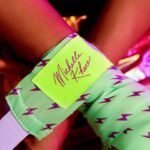 Michelle Khare Instagram - Y’ALL!! We are SOLD OUT of our custom stars and sparks black and blue hand wraps!! We STILL have a few of the green and purple avail 👀 grab ‘em before they get knocked out! 🥊 Still so blown away by the support for our apparel with @seek.discomfort and I am so in awe of all of you for taking on boxing as a challenge of your own!!! 🥹
