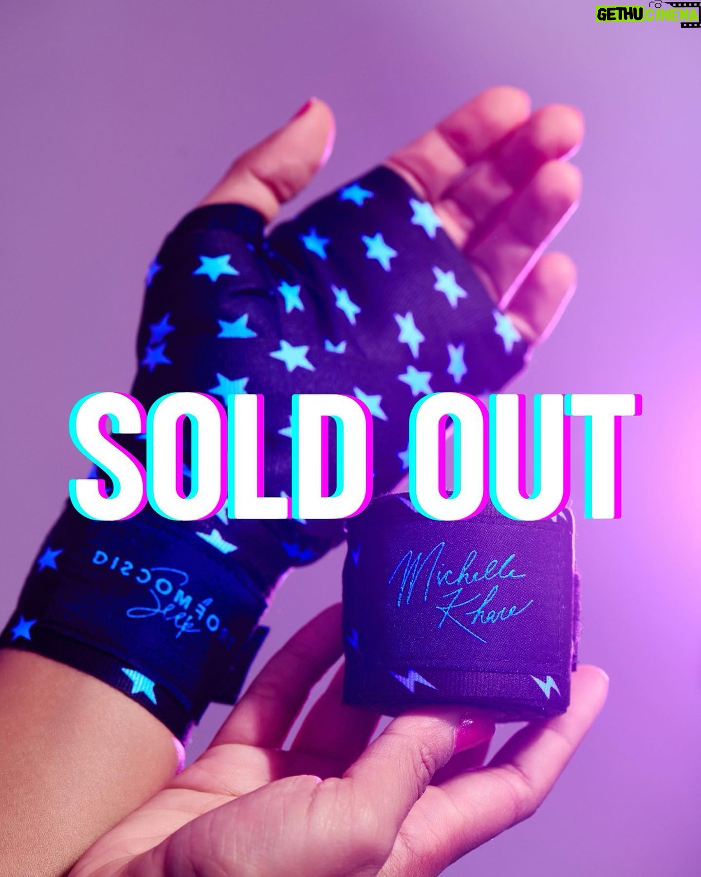 Michelle Khare Instagram - Y’ALL!! We are SOLD OUT of our custom stars and sparks black and blue hand wraps!! We STILL have a few of the green and purple avail 👀 grab ‘em before they get knocked out! 🥊 Still so blown away by the support for our apparel with @seek.discomfort and I am so in awe of all of you for taking on boxing as a challenge of your own!!! 🥹