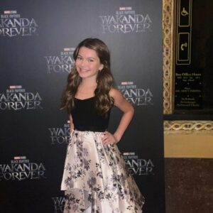 Mila Harris Instagram - 🎥🍿So much fun at the premiere of Black Panther 2 Wakanda Forever 🤍 Thank you @disney @marvelstudios for an amazing film and an awesome evening! 🌟🖤 #blackpanther #wakandaforever #disney #marvel #redcarpet #made #in #georgia #atlanta #film #legendary #amazing #actors #brilliant #storytellers #mustsee #theater #cinema #comingsoon #black #panther #rules #remember #chadwickboseman #forever #love #life #movie #magic @paradigmtalentagency @jenjen2010 @shanellegray @mvpsem