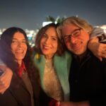 Minnie Driver Instagram - #christmas eve with a selection of beloveds. What a blinking JOY…And wearing what has now become known as my 💘💫dopamine coat 💘💫 @miramikati @iknowbrianawitan @rockyallegra @melissasmithiam @jesvnew @allyvalenti * Bill my Hen 💫🎄💫
