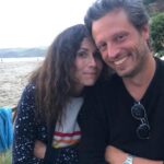 Minnie Driver Instagram - It’s our anniversary today . Five years filled with laughter, grief, creativity and becoming our little tribe of 4 ( counting Bob) Here we are on our first formal date, which was a v.glam affair, and you made me laugh so much I spilt a seam in this beautiful dress. Slide 2 is how we really are: happy, eating, by the sea. Love you @addisonodea #anniversary glorious gown @carolinaherrera @wesgordon