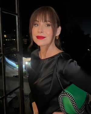 Minnie Driver Instagram - Frankly , I had to really cajole myself out of my pyjamas … I did it with a JW Anderson dress and exquisite bag, Missoma earrings and a mighty Tilbury red lip. Good work @jonlieckfeltbeauty   @gregoryarlt thank you for a beautiful evening @chanelofficial   @finchandpartners 💫  @jw_anderson @charlottetilbury @missomalondon