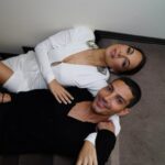 Moran Atias Instagram - This year I have a lot to wish for. It has been the worst year of my life. The grief, pain and sorrow has swallowed me but I want to honor LIFE. I have survived. it comes with guilt but I allow the gratitude in as well. I am alive and I have friends, family and a life I have created. A daughter. I’m celebrating that. It’s ok. It doesn’t take the pain away but the pain needs a relief. Last night I wanted to be with FRIENDS and FAMILY because I NEED a community. I need people. And we have different opinions but we have a HEART leading us to chose to LIVE. Honor the dead and the LIVING. I don’t want to forget living. That darkness lives next to light. That tragedies happen but so do MIRACLES. And light lives despite and because of it. I’m grateful for my community that despite this has been the worst time in my life I am still able to find compassion. I Listen with curiosity and speak from my heart. And it may be visceral but I tell myself it’s ok I’m still bleeding but it is passion and love. No war can defeat my hope for humanity and peace yes peace with ourselves and with others. I wish for a lot more this year cause a lot has been gone. And it might sound crazy but I rather be crazy and wish for Peace. For me it means that I accept you for who you are but we set boundaries so we can both heal and LIVE. Thank you for my friends that are all going through challenges and moments of joy. Thank you for coming. I need to light up the candle that is my heart and it shines better with you. I love you all. I love people I love the world 🌍 grateful to be another day, a year here, in this world. And hopefully I can help create a better one so my next birthday wish would be shorter and more like I want new shoes. Pictures @shohattom Glam @yanivkatzav Dress @dundasworld