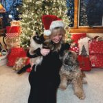 Morgan Huelsman Instagram – our first family picture since Hazel’s adoption (do you know how hard it is to get a pic with a cat?!?!) & her very first Christmas with us!! 🥹 Remi being adorable, per usual. merry christmas && happy holidaysssss