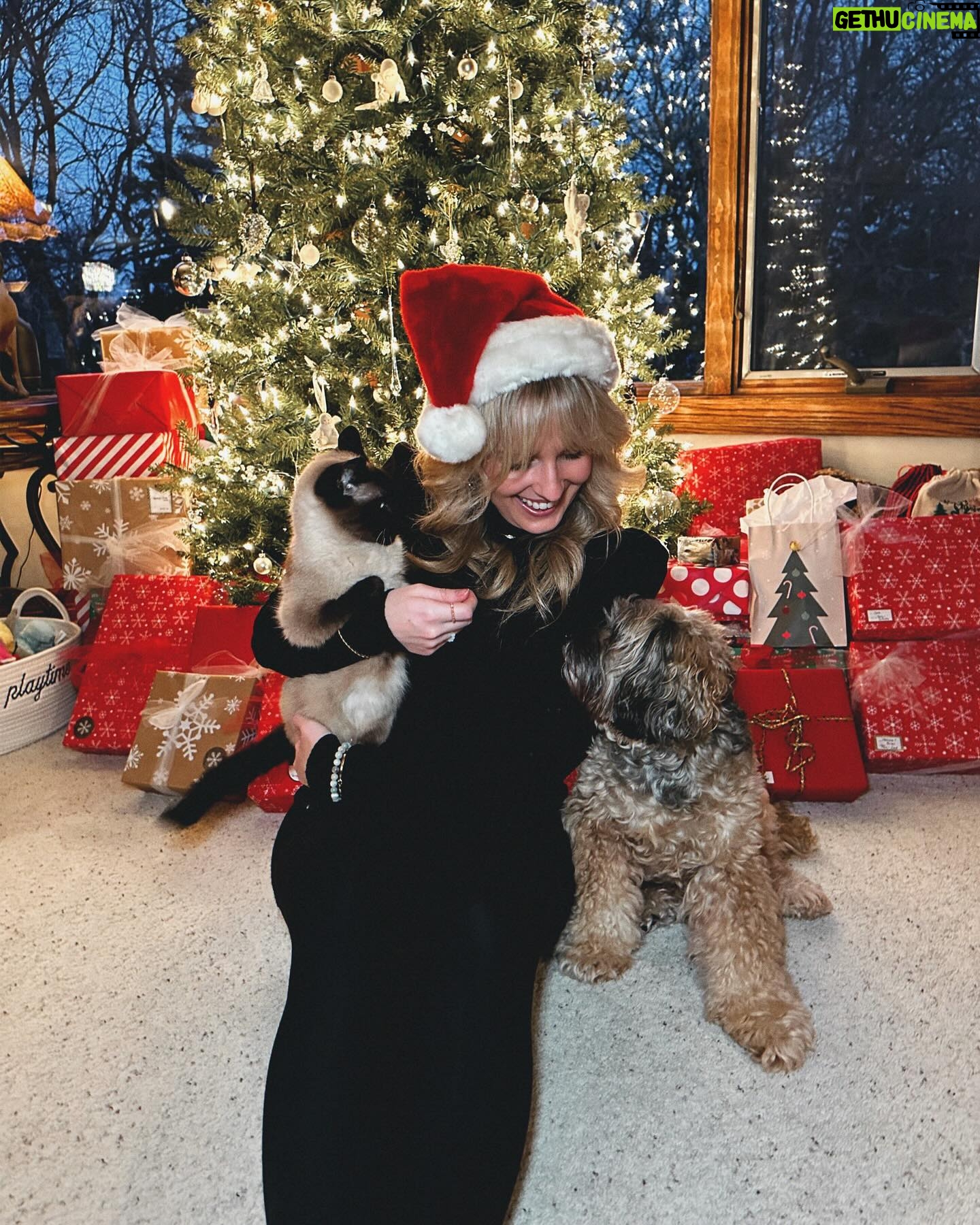 Morgan Huelsman Instagram - our first family picture since Hazel’s adoption (do you know how hard it is to get a pic with a cat?!?!) & her very first Christmas with us!! 🥹 Remi being adorable, per usual. merry christmas && happy holidaysssss