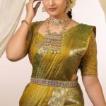 Mounika Dev Instagram - Classic with a modern touch Featuring gorgeous actress : @mounikadeviofficial Fabulous saree : @houseofayati Fascinating Blouse : @ashtag_sewing Slaying the drape stylishly : @style_with_anbu Captivating jewels: @aarvee.chennai Creative styling : @hannah.glory Complimenting video & photography: @sano_visuals Beautiful Hairdo : @_stylenart_ Makeup : @subsartistry . . . . . . . . . . #reels #instagram #actress #celebrity #brides #mua #hairstylist #sareedraping #sareelover #stylist #bridaljewellery #jewelry #designerblouse #jasmine #braid #bridalinspirations #engagement #wedding #glassglow #eyes #reelsvideo