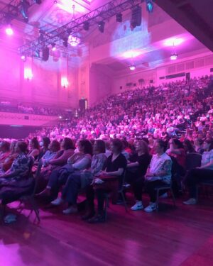 Myf Warhurst Instagram - Melbourne, I still can’t quite believe what happened. Doing Bang On Live in the iconic Melbourne Town Hall as part of the @melbcomedyfestival was a dream come true. Thank you to @joelcreasey for being our magnificent special guest, @kitwarhurst for singing a beautiful song about our childhood memories, @kateradfordmua for the hair and makeup, and to everyone else who helped make this real. Hugest thanks go to my partner in crime @zanrowe. What a gorgeous thing we’ve created together. How lucky we are to have an audience like our precious Bang Fam. 🧡🩷 I need a lie down now x