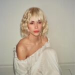 Nadia Hilker Instagram - Hugs & Wigs Missing my Pacho snuggles… 📸 by @jaabaaluu #PuppyLove #BestBuddy #DogLove #BlondHair #NadiaHilker #FridayMood #DressUpFriday #ThrowBack #DogMummy #EndlessLove #snuggles