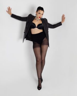 Naima Mora Instagram - Did I leave lipstick on your collar? … “Bird Of Paradise” a photo series by Naima 
Look 3 of 3
Shot by : Harris Davey @harrisdaveyphoto 

Posing gives me freedom. In the season of my career it’s all about fun for me. Exploring elements of femininity in this series, was also returning to my love of playing dress up and an homage to my childhood self. I wanted to play on the archetype of the early 90’s model and what my mom looked like to me growing up, a bird of paradise.

Wearing : @sergiohudsoncollection from @crescala