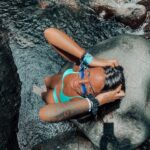 Nani Trinidade Instagram - Prêter attention au soleil sur votre visage peut calmer votre esprit quand il s'emballe. #guadeloupeislands #cascadedesecrevisses #antilles #greeneyes #summervibes #chill