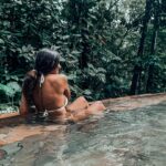 Nani Trinidade Instagram – 📍Le bain des amours, Guadeloupe. 

Un bassin en forme de cœur plongé dans la nature, une eau à plus de 30 degrés chauffée par le volcan 🌋 la Soufrière qui se trouve tout près d’ici. 
On était seul au monde 🌍 
#guadeloupe #baindesamours #paradiseisland #bainchaud