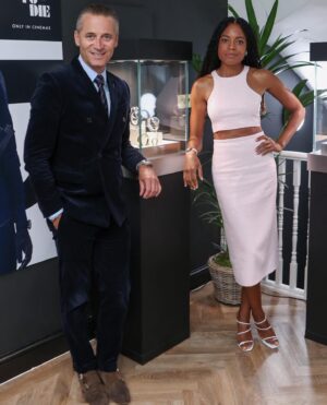 Naomie Harris Instagram - What a whirlwind the last 48 hours have been! Flew to London to visit the Regents Street flagship @michaelkors store, and help with the launch of the fabulous #mkcx007 Bancroft bag! Then stopped by the pop up @omega store at the Burlington Arcade to preview the latest collection of Bond related watches! A quick outfit change and onto the red carpet for the Bond premiere! Followed by a few hours sleep and back on a plane to Spain to continue filming! Mental! But soooo much fun! Thank you @michaelkors for the stunning outfits, and thank you @omega for always providing the perfect accessory for any outfit!! Photographer credits: @mikemarslandphotos @johnallenphillipsphoto