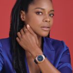 Naomie Harris Instagram – Things are brightening up with @omega and the iconic #omegaconstellation . Along with the sensational watch in blue, their 18K gold jewellery helps complete the look. #ad