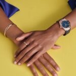 Naomie Harris Instagram – Things are brightening up with @omega and the iconic #omegaconstellation . Along with the sensational watch in blue, their 18K gold jewellery helps complete the look. #ad