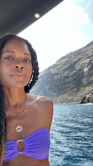 Naomie Harris Instagram - Thank you @magmaresortsantorini for hosting me at your magical resort in #santorini #greece organised by @beyondtalentglobal & @swot.gr 🙏🏾 I have travelled all over the world for work, but usually for no more than 48 hours. I get to a new country, go straight to the hotel, and into hair and makeup to get ready for whatever press engagement I’m there for, so I don’t really get to actually see the country I’m in. I’m determined to change that pattern, so when @omega invited me to #mykonos I decided to stay a week extra to explore a bit more of Greece. I traveled to #Paros first and then onto Santorini… and I can honestly say of the 3 Greek islands I visited, it was Santorini that captured my heart. Although I’m not sure if it was the feel of the island as a whole, or just the magical, healing and calming energy at  @magmaresortsantorini  Either way, I’ll definitely be back!! 🌟 🙏🏾 @seasanto_boat_cruises for the incredible boat tour! 👙 @awaythatday