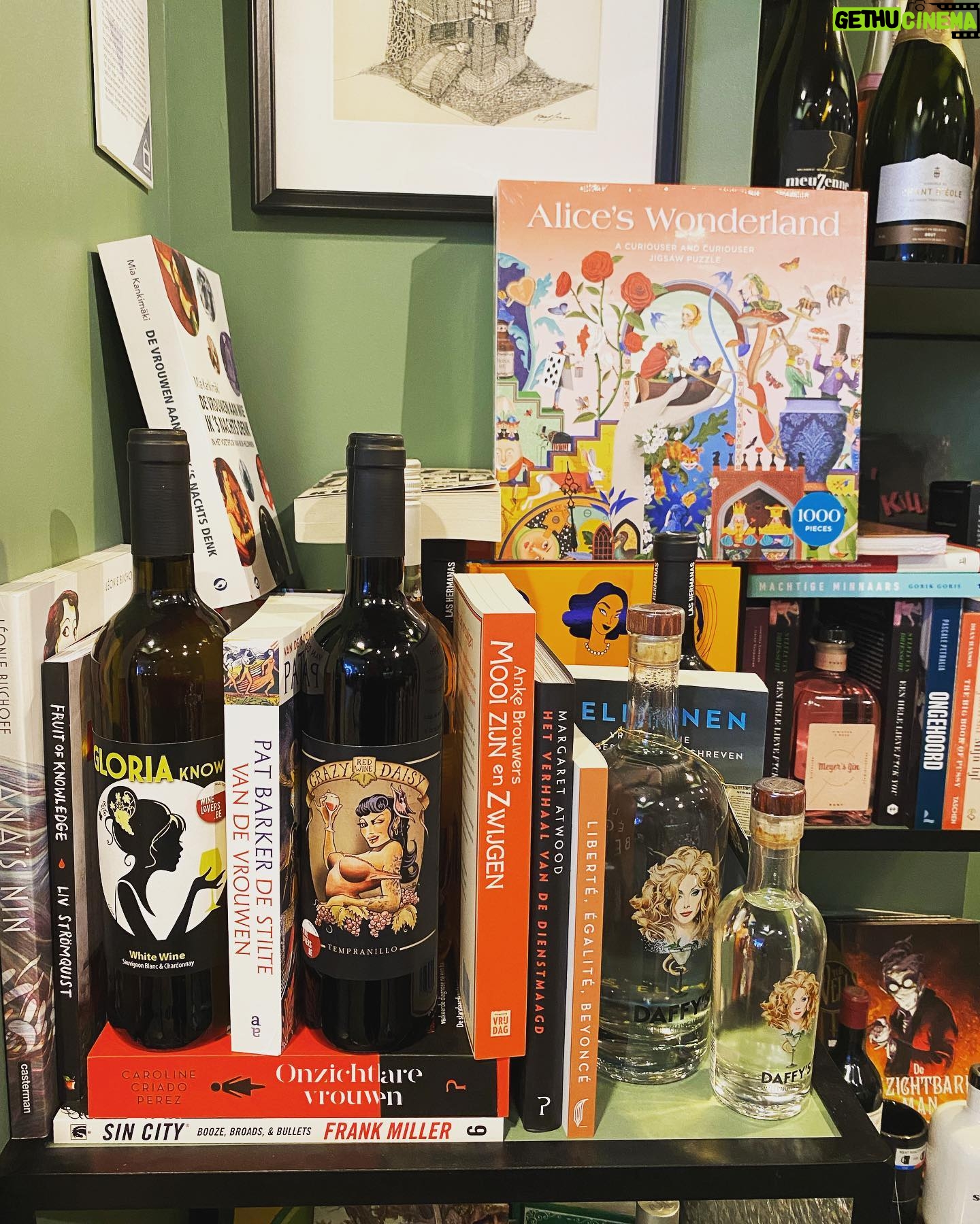 Natalia Tena Instagram - Yesterday I found my happy place in Ghent @bookznboozegent. Incredible bottles of wine and spirits nestled amidst beautiful books according to theme interspersed with records. This section is the strong ovary section. Alcohol made by women, books written or starring strong female leads. I hung out there a good while with a glass of Gloria wine. PLEASE OPEN A BOOKSHOP LIKE THIS IN LONDON!