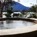 Natalia Tena Instagram – I have just left my heart in @puyuhuapilodge. In all my 38 years on this planet, I have never been somewhere as beautiful and as tranquil. A myriad of natural hot springs to relax in (open 24 hrs because nature doesn’t sleep) surrounded by the verdant forest and the cold refreshing fjords to dive into (also I went accidentally with dolphins.) This secluded Eden, (with no wifi or reception) is only accesible by speedboat and makes you feel like you’ve fallen into a wild fantasy world (JURASSIC PARK 🦖🦕) The staff were beyond lovely, Esteban kept our drinks full with the incredible local @tepaluma Gin (amongst many) Tere escorted us anywhere and everywhere with an impecable soundtrack and knowledge of the forest, Cindy fixed my entire body broken from 2022 and the daily menu was a party for both my eyes and my mouth. If I found out I was dying imminently, I would sell everything and spend my last days on earth here. Gracias a @chiletravel por darme esta experiencia y a todos en este hotel tan mágico ❤️❤️