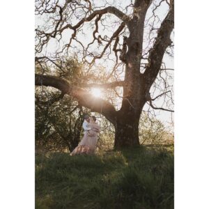 Natalie Krill Instagram - Life is truly a magical rollercoaster. We couldn’t be more excited about our newest additions. Turning our little family of 3 into a family of 5. 
This July we will welcome our little twins 💕 
Good one, universe 😉
The biggest thank you to our dear friend @innersolsticephotography for capturing these moments for us. 🤍🤍🤍
My beautiful dress courtesy of @valley_of_wanderlust 
🤍🤍🤍
