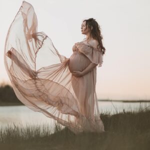 Natalie Krill Instagram - Life is truly a magical rollercoaster. We couldn’t be more excited about our newest additions. Turning our little family of 3 into a family of 5. 
This July we will welcome our little twins 💕 
Good one, universe 😉
The biggest thank you to our dear friend @innersolsticephotography for capturing these moments for us. 🤍🤍🤍
My beautiful dress courtesy of @valley_of_wanderlust 
🤍🤍🤍