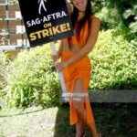 Natalie Burn Instagram - I stand with SAG-AFTRA. “One person can make a difference and everyone should try.” #sagaftra #sagaftrastrong @sagaftra 🧡👈 #edwardjamesolmos
