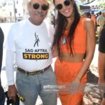 Natalie Burn Instagram - I stand with SAG-AFTRA. “One person can make a difference and everyone should try.” #sagaftra #sagaftrastrong @sagaftra 🧡👈 #edwardjamesolmos