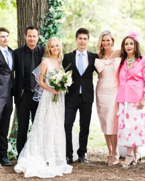 Natasha Henstridge Instagram - My son got married last week and what a special milestone it was! I could only post this picture of me with three chins because it encapsulates the incredible moment of pride and joy so well haha:) They got married on their own property. It was the most special, touching, healing, fun wedding. We all came together and laughed and cried and danced… Thanks to the Crywer family for having an awesome daughter and throwing a great party, thanks to all of the friends and family that flew in to celebrate such a beautiful occasion and lighting up the dance-floor 💃🕺🏼We’re so blessed.🥂🤍👰‍♀️🤵‍♂️ Big shout out to @cpixaperture for great photos and @phelony18 for officiating a beautiful service.Enrique for taking so many great pics as well! OMG the band!!!!