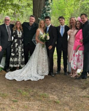 Natasha Henstridge Instagram - My son got married last week and what a special milestone it was! I could only post this picture of me with three chins because it encapsulates the incredible moment of pride and joy so well haha:) They got married on their own property. It was the most special, touching, healing, fun wedding. We all came together and laughed and cried and danced… Thanks to the Crywer family for having an awesome daughter and throwing a great party, thanks to all of the friends and family that flew in to celebrate such a beautiful occasion and lighting up the dance-floor 💃🕺🏼We’re so blessed.🥂🤍👰‍♀️🤵‍♂️ Big shout out to @cpixaperture for great photos and @phelony18 for officiating a beautiful service.Enrique for taking so many great pics as well! OMG the band!!!!