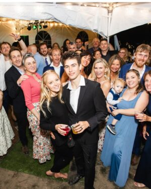 Natasha Henstridge Instagram - My son got married last week and what a special milestone it was! I could only post this picture of me with three chins because it encapsulates the incredible moment of pride and joy so well haha:) They got married on their own property. It was the most special, touching, healing, fun wedding. We all came together and laughed and cried and danced… Thanks to the Crywer family for having an awesome daughter and throwing a great party, thanks to all of the friends and family that flew in to celebrate such a beautiful occasion and lighting up the dance-floor 💃🕺🏼We’re so blessed.🥂🤍👰‍♀️🤵‍♂️ Big shout out to @cpixaperture for great photos and @phelony18 for officiating a beautiful service.Enrique for taking so many great pics as well! OMG the band!!!!