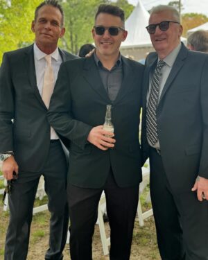 Natasha Henstridge Instagram - My son got married last week and what a special milestone it was! I could only post this picture of me with three chins because it encapsulates the incredible moment of pride and joy so well haha:) They got married on their own property. It was the most special, touching, healing, fun wedding. We all came together and laughed and cried and danced… Thanks to the Crywer family for having an awesome daughter and throwing a great party, thanks to all of the friends and family that flew in to celebrate such a beautiful occasion and lighting up the dance-floor 💃🕺🏼We’re so blessed.🥂🤍👰‍♀️🤵‍♂️ Big shout out to @cpixaperture for great photos and @phelony18 for officiating a beautiful service.Enrique for taking so many great pics as well! OMG the band!!!!