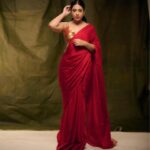 Nayana Elza Instagram - A red saree is a statement of inherent grace 🌹 . . . 📸 @jibinartist @plan.b.actions Saree @larobedesignerboutique Styling @merlin_lizbet MUA @ajayanmakeupartist @sibin_hair_stylist . . . . . , . . . . #saree #red #ootd #flauntinginsaree #nayanaelza #style #fashion #instadaily #instafashion