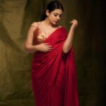 Nayana Elza Instagram - A red saree is a statement of inherent grace 🌹 . . . 📸 @jibinartist @plan.b.actions Saree @larobedesignerboutique Styling @merlin_lizbet MUA @ajayanmakeupartist @sibin_hair_stylist . . . . . , . . . . #saree #red #ootd #flauntinginsaree #nayanaelza #style #fashion #instadaily #instafashion