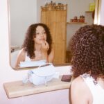 Nia Pettitt Instagram - Thank you SO much for the love on @TheCurlBarLondon announcement. 💕✨🦋 — It’s been quite the journey and the truth is.. if you would’ve told me a year ago I’d be here; I wouldn’t of believed you. When I first opened the salon, I was incredibly naive and had NO IDEA of what journey awaited me, what uncomfortable growth I needed to grow through and the new version of myself that I’d meet. I knew nothing about running a business and had to learn every single thing from making mistakes and failing. At first I was trying so hard to please everyone, I thought I could balance being a full time content creator, a full time boss and manager of staff and clients, a devoted girlfriend to my ex at the time, a good friend and a always there to rely on daughter or sister. I ended up sucking at it all burning myself to the ground. I became the saddest version of myself that I had never met before but I needed to meet her to be where I am today. I’m ready for this new chapter of my life and I’ll be sharing absolutely EVERYTHING renovation and building a business with you so I hope that you’ll enjoy this chapter of my life. To all the customers who visited my salon, made reviews, gave critique, returned, told their friend and their sister, celebrated with us and laughed with us. This wouldn’t be possible if it wasn’t for you. So thank you. Truly. All I know is, I’m going to take all those lessons and make this one even better for you. 💕 #TheCurlBarLondon