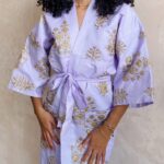 Nia Pettitt Instagram - The kimono of my DREAMS. 🦋✨💕 — Lilac is my favourite colour and when I saw this on Instagram I had to get it. It is so beautiful and something I can see myself wearing in so many different ways. I got my earrings from the airport in Zanzibar for $7. They were too beautiful to leave behind. I love how my style is a true reflecting of who I am. #niaTHELIGHT 💜💜💜
