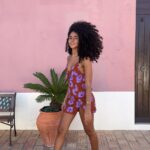 Nia Pettitt Instagram - Ola from Portugal 🌺✨💓 #niaTHELIGHT — dress @pullandbear, shades @byzeena & shoes @officeshoes!