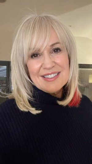 Nicki Chapman Instagram - Berry Red streak is still going strong… even though I’ve got drenched practically every day like all of you. Havoc with the blo drys 😉😩

You picked this colour ‘festive red’. I wasn’t sure but now love it ❤️ & it hasn’t faded at all. Next time? Might put it out there for you to decide

#paidfor 

They say it takes an army. Well that’s the truth for my locks ❤️

Extensions @soniajittlahairstylist @richardwardhair 
@greatlengthsuk 

Blo dry @blo_bar_london 

Blonde highlights @gabrielladonovan
