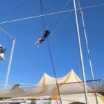 Nicky Whelan Instagram - How are you starting your 2024? Can I suggest heading down to the Mornington peninsula catching the incredible @silverscircus followed by private lesson on the trapeze with @the.fly.factory ! Everything you want is on the other side of fear. Fuck yes to everything let’s go #summerloving #Australia 👊🏼🇦🇺🫣