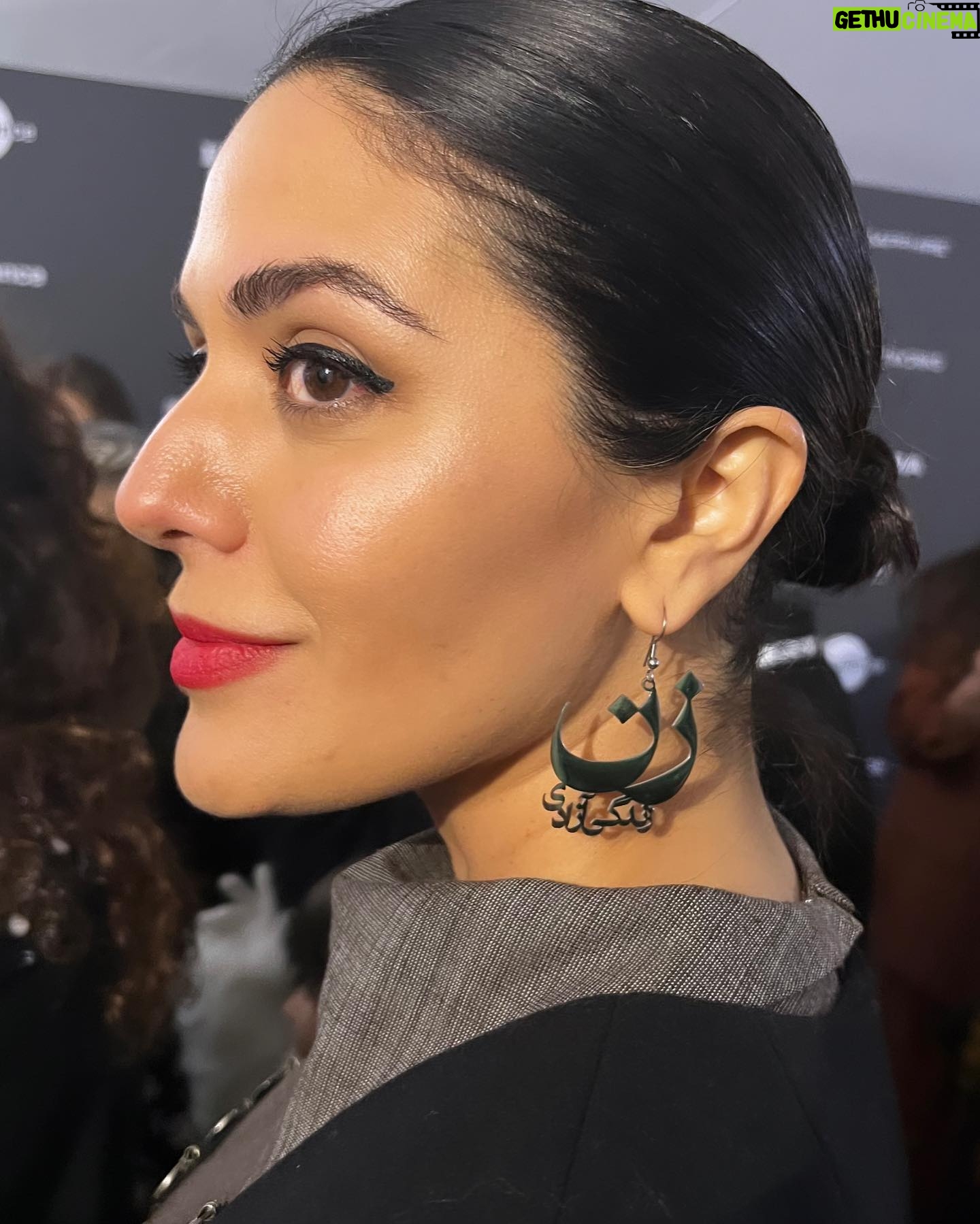 Niousha Noor - 5.1K Likes - Wow... U.S. Dramatic Audience award?! This is incredible. Thank you!! @sundanceorg
💚🤍♥️
It was an honor for me to be at Sundance for a movie about the Iranian-American experience, and even more honorable to have worn a Kurdish inspired design created by Kurdish-Iranian-American designer @jilaatelier, in memory of Kurdish-Iranian Mahsa Jina Amini — the 22 year old woman whose death at the hands of the Islamic Republic sparked the current uprising in Iran.
In this uprising, the regime is witnessing something they have systematically worked hard to prevent: unity. From Sistan Baluchistan in the southeast to Kurdistan in the northwest, the people have united to voice their disdain for a regime that's been oppressing them for 44 years.
I know I don't save lives by wearing this or by talking about Iran at Sundance. But storytelling is a powerful tool in turning a page on prejudice and indifference. And I can tell you with the utmost confidence that Iranians at the biggest US independent film festival were very present and very vocal — and people are listening.
I'm forever inspired by the brave revolutionaries in Iran who are the ones causing a perceptible shift in how Iranians are seen, and we as artists owe it to them to further expand on this empathetic shift and bring more and more real human — and Iranian — stories to life.
With that, I'm beyond grateful for this movie, The Persian Version, for being a window into an Iranian-American experience, but at its core shining a light on the strength and resilience of Iranian women.
Thank you @marakeshfilm for bringing your beautiful story to life. And a huge congratulations to everyone involved. I absolutely love my @tpv_film family.
Woman. Life. Freedom.
#زن_زندگی_آزادی
💚🤍♥️
Earrings: @persian.jewelry 🙏🏼