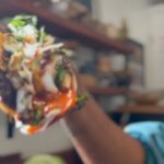 Nyesha Arrington Instagram - Before the year ends, I wanted to show you my version of the viral 2023 #Smashburgertaco which also happen to be two of my favorite food groups in one! 🍔 🌮=🔥 Spicy Smash Burger Taco Ingredients Burger blend: Dry aged ground beef Bone marrow Soy sauce Garlic Ginger Serrano chili Sesame oil Scallion greens, sliced thin Scallion whites, julienne Gochugaru Black pepper Kosher Salt American Cheese Sauce Gochujang Kewpie Mayo Garnish Cilantro, onion Salsa Macha Lime