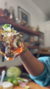 Nyesha Arrington Instagram - Before the year ends, I wanted to show you my version of the viral 2023 #Smashburgertaco which also happen to be two of my favorite food groups in one! 🍔 🌮=🔥 Spicy Smash Burger Taco Ingredients Burger blend: Dry aged ground beef Bone marrow Soy sauce Garlic Ginger Serrano chili Sesame oil Scallion greens, sliced thin Scallion whites, julienne Gochugaru Black pepper Kosher Salt American Cheese Sauce Gochujang Kewpie Mayo Garnish Cilantro, onion Salsa Macha Lime