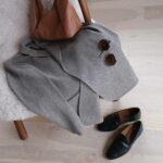 Olesya Rulin Instagram - Being a sustainability advocate and an influencer sometimes seems like opposites. That’s why I believe in using your purchasing power and investing in quality pieces that last season after season. Here’s a quick get ready with me with some pieces of my closet that have been with me for over a year and will stay in my closet for many more years to come. @billy_reid blazer @citizensofhumanity horseshoe denim @margauxny black loafer @kinnstudio gold chain @scanlantheodore sweater bra top @verawanggang sunglasses @scanlantheodore purse @diorbeauty gloss @kismet.olfactive perfume