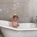 Olesya Rulin Instagram - Ladies and gentlemen, we have a main bath! It’s taken me a year to finally be able to give you a before and after of our main bath which my husband single-handedly built. I don’t understand how he does it but I am forever grateful. Now that the dust has literally settled, I’m going to be showcasing more of the before and after of our renovations. Here’s the first highlight of our bathroom where we used upcycled materials, including the shower glass and the large gray tile. Our beautiful bathtub, vanity, and shower hardware are all from @vintagetub who we were happy to work with. The quality and craftsmanship of @vintagetub surpassed my wildest dreams, and I’m thrilled to have them in our home for many years to come. * side note my husband does NOT build houses for a living. He actually designs women’s clothing that being said get yourself a man that’s an Eagle Scout has OCD and perfectionist qualities because my tile work is on point.