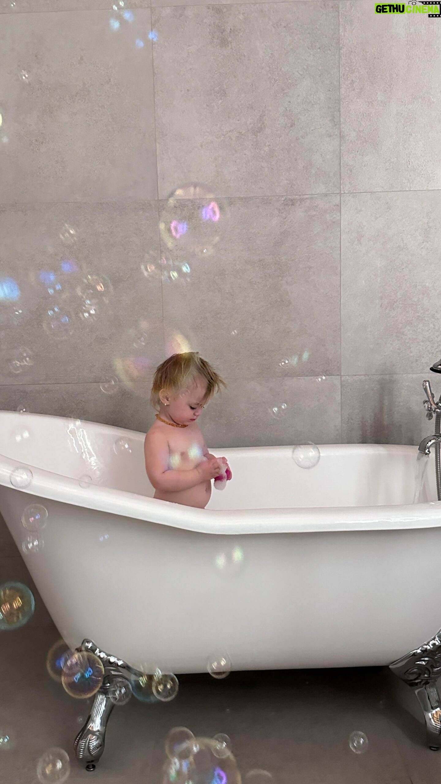 Olesya Rulin Instagram - Ladies and gentlemen, we have a main bath! It’s taken me a year to finally be able to give you a before and after of our main bath which my husband single-handedly built. I don’t understand how he does it but I am forever grateful. Now that the dust has literally settled, I’m going to be showcasing more of the before and after of our renovations. Here’s the first highlight of our bathroom where we used upcycled materials, including the shower glass and the large gray tile. Our beautiful bathtub, vanity, and shower hardware are all from @vintagetub who we were happy to work with. The quality and craftsmanship of @vintagetub surpassed my wildest dreams, and I’m thrilled to have them in our home for many years to come. * side note my husband does NOT build houses for a living. He actually designs women’s clothing that being said get yourself a man that’s an Eagle Scout has OCD and perfectionist qualities because my tile work is on point.