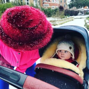 Olwen Catherine Kelly Instagram - We finallyyyy got a sprinkling of snow this morning. I'm not sure that Lulu was overly excited but I got to wear my ski-suit for the first time in two years (admittedly it was much harder to get in to after having a baby...)💕#snowday #firstsnow