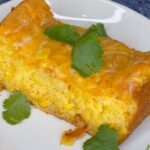 Omallys Hopper Instagram – Corn Bread Cheesy Cake 🙌🏽🙌🏽🙌🏽 

Ingredients: 
-2 boxes of jiffy corn bread mix 
-4 eggs 
-1 stick of unsalted butter melted 
-1/2 tsp Baking Powder 
-1 1/2 blocks of cream cheese
-2 cups of shredded cheese (you pick) 
-1 can of corn 
-1 can cream of corn 
-pinch of salt 
-1 tbsp sugar 

Mix well and place in oven at 350 for 40 minutes