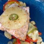 Omallys Hopper Instagram - Making this jalapeño pineapple salmon was so much easier using my Reynold’s Baking & Cooking Paper … watch how I use it to make this delicious dish in minutes. Ven pa’ca que te voy a enseñalllll @reynoldsbrands #reynolds #ad