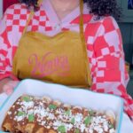 Omallys Hopper Instagram – Mi Gente, you all know how much I love inventing and being innovative in the kitchen, I’m the WONKA in my chocolate factory 
😊
Sooo, 2 things below! #WonkaMovie @wonkamovie #WBPartner

1. You have to try this MOLE recipe 
2. You have to go watch the new WONKA movie in Theaters December 15 
🎉🎉🎉
 Ya te lo dije 
😉🎩

Ingredients for Mole: 
-3 chiles pasilla 
-2-3 chile guajillo 
-7-9 chile pulla 
-1 onion 
-1 garlic clove 
-2 tomatoes 
-1 corn tortilla
-1/4 cup of Mexican Spices (Relajo)
-1 round of Chocolate Abuelita 
-1/3 cup of Piloncillo (Panela) 
-1 cube of chicken bouillon 
-1/2 cup of chicken broth