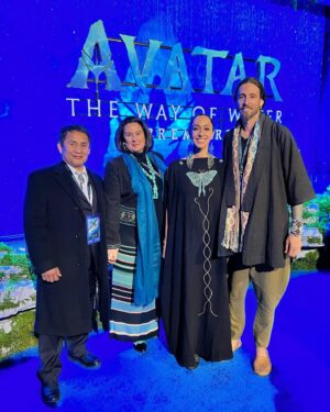Oona Chaplin Instagram - Had a whale of a time at the #Avatar2 premier last night! Was in the great company of Gen and Aldred Wood - LEGENDS of the tipi- and my home tree @an_ka_amaru. 
Also got to wear a dress I made and painted, and got to see the BEST birthday buddy one could ever wish for @bethanymccarty, who did my face. Thank you sis!! 
Overjoyed to hug @duane.evans_ @aliciavelabailey @jackchampion and #SLANG, along with many of the @avatar family. My heart was full to reconnect and see the fruits of everyone’s hard work, and see how proud everyone was. The film is breathtaking! 
Already looking forward to #A3 in a couple of years, it’s all very exciting… 
@weartheprayer @avatar #YES #homemadedress