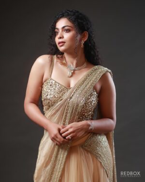 Padeni Kumar Instagram - Rise high like no one can reach you 🔥
.
Makeover : @makeupandhairbyrehana 
Wearing : @fatiz_official
Jewelry : @jjjewellerymart
Shot by : @redboxphotography
Concept & Styling : @makeoverbyimti
.
#portraits #photography #cinema #padinekumar #curly #love #eyes #makeup