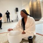 Patrisse Cullors Instagram - Grateful to have been asked by @southernguildgallery to support the opening ceremony for their LA launch. @andiledyalvane and the entire sound healers from South Africa reminded me that the diaspora is always asking for us to gather in ceremony. Our ancestors want us to call them in to play and heal. I practice IFA, I pray to my ancestors, I believe in the power of African spirituality and the way it heals ALL of us. My work as an artist and abolitionist isn’t separate from spirit. I am grateful that at 40 years old I get to keep digging into my legacy and my history. I may have been stolen from Africa but Africa will not be stolen from me. Camagu! Aśe oooooooooooooo! 📸 @asharaekundayogallery @blublakwomyn 🎥 @alexandrealirezadorriz Dress: @marahoffman Jewelry: @santanaandco and @sincerely_antoinette